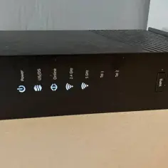 Router Arris TG2492 z przyciskiem WPS. Dowiedz się, wps co to jest i jak działa.