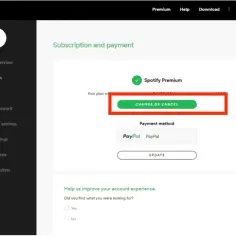 Ekran Spotify z opcją "Zmień lub anuluj" pod "Spotify Premium". Tu dowiesz się, jak zrezygnować z Spotify Premium.