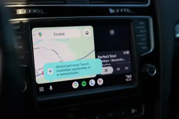 Nowa aktualizacja android auto z Gemini jako asystentem AI w samochodzie. Widok nawigacji i odtwarzacza muzyki.